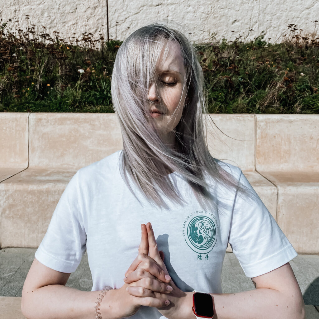 A girl in standing meditation