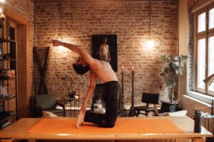 woman doing camel yoga pose